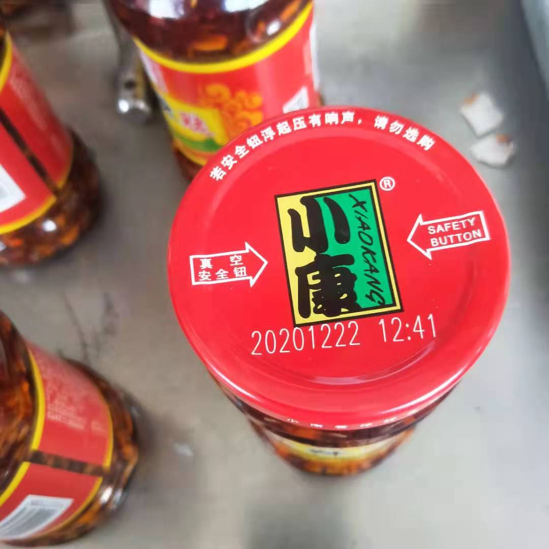 激光打碼食品罐頭金屬蓋——徐州惠爾德激光機(圖1)
